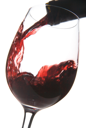 Red wine being poured into glass