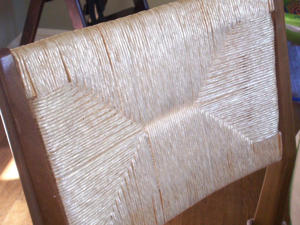 Close-up of plastic-y rush chair back Close-up of plastic-y rush chair back