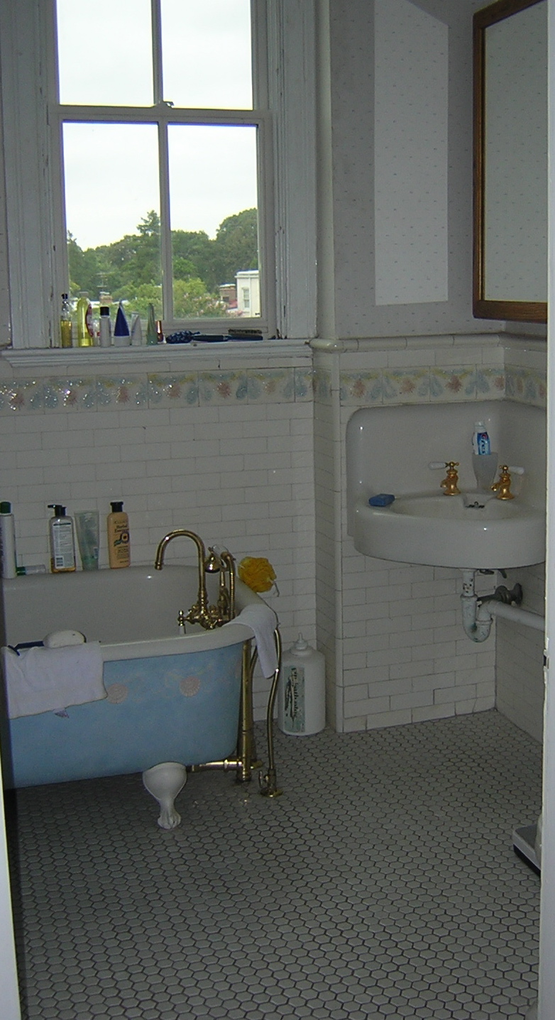 Old bathroom with claw foot tub