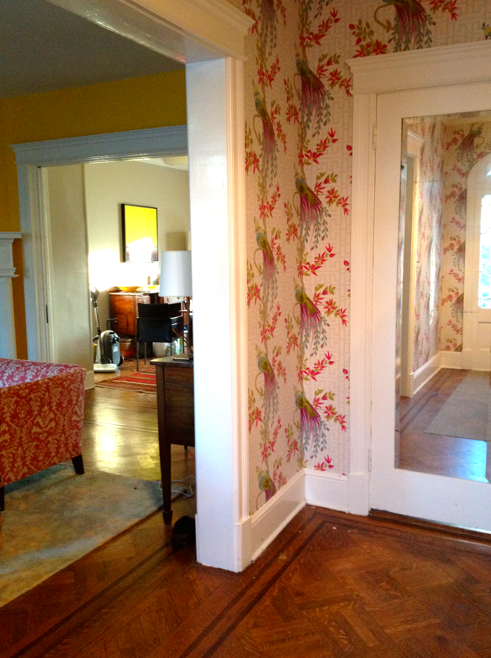 Messy house from wallpapered foyer Messy house from wallpapered foyer