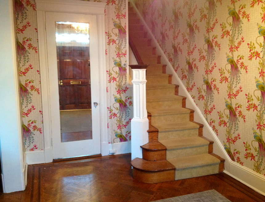 Foyer and stairwell with peacock wallpaper Foyer and stairwell with peacock wallpaper
