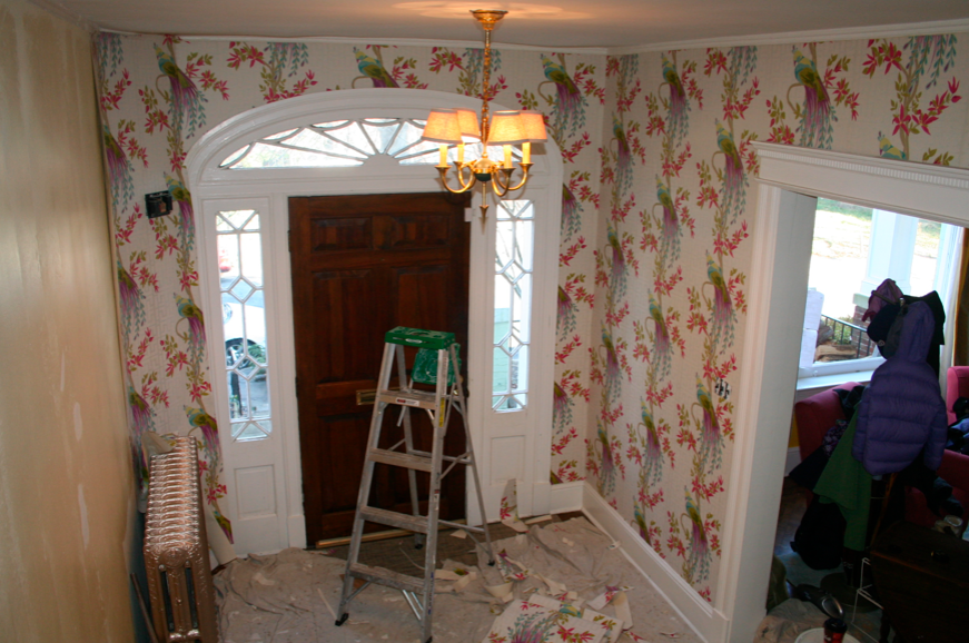 Foyer being wallpapered Foyer being wallpapered