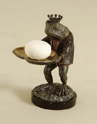 Sad frog holding soap