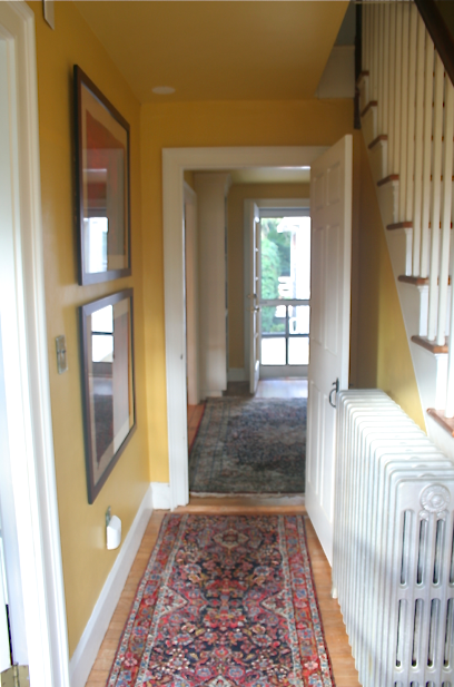 Yellow foyer hallway 19th century farmhouse