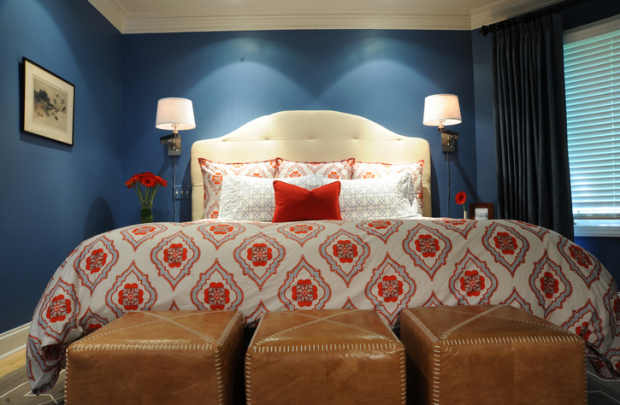 Navy blue bedroom with red and white John Robshaw bedding