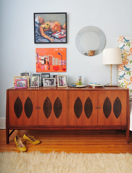 Danish modern cabinet with oil paintings