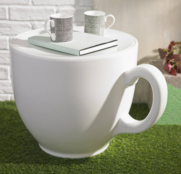 White teacup shaped stool or side table