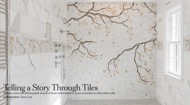 White bathroom with dramatic tree in gold and glass mosaic tiles