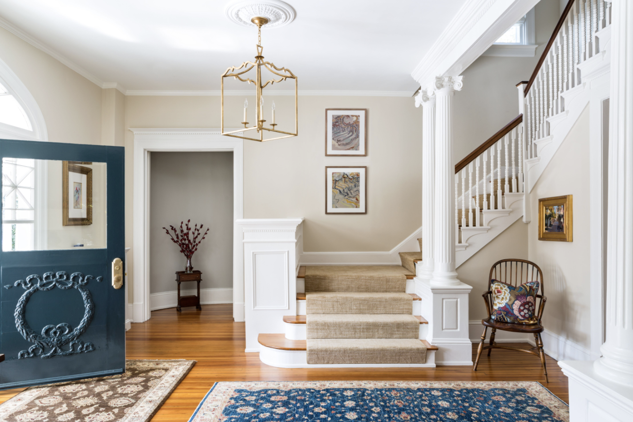 Grand foyer of a historic home by Annie Elliott Design