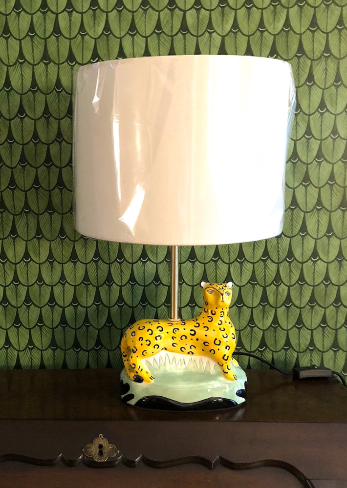 Ceramic lamp with cheetah figurine as the base