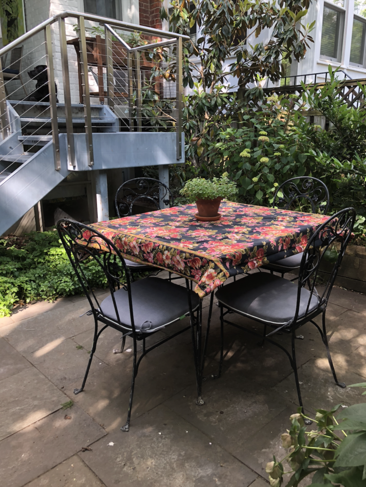 Urban garden looking up at porch