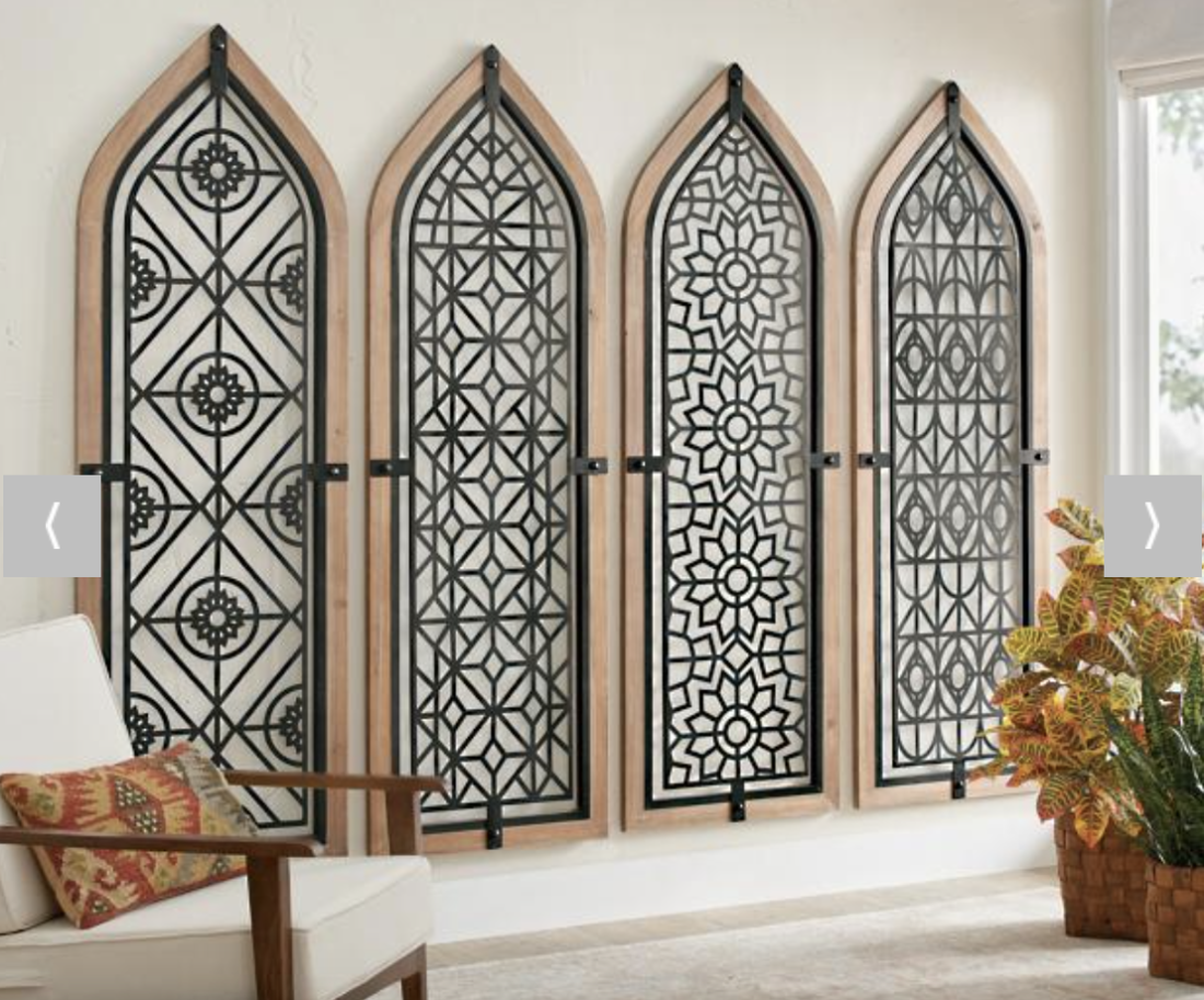 Metal gates hanging on wall