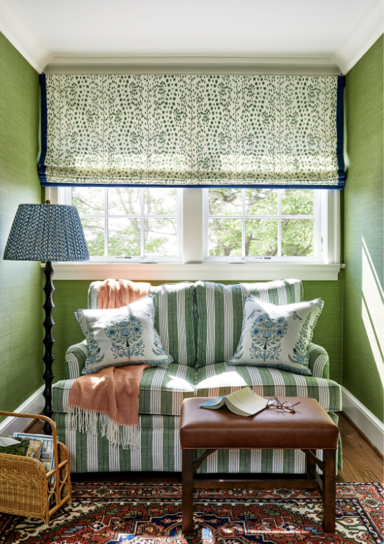 Green and white striped loveseat