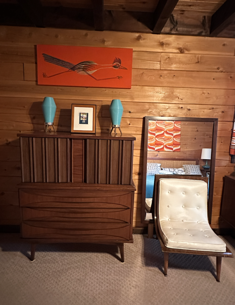 Mid-century bedroom with wood dresser