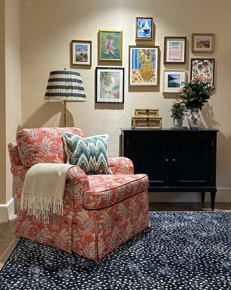 Pink patterned chair on blue antelope rug