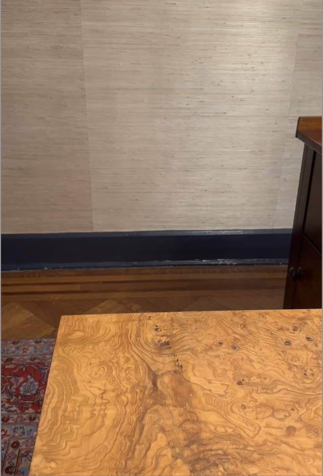 Burlwood table with natural grasscloth