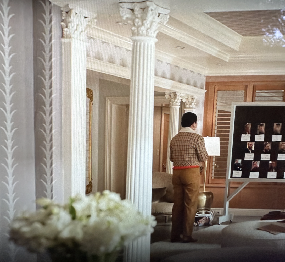 Woman in neutral room surrounded by neutral rooms