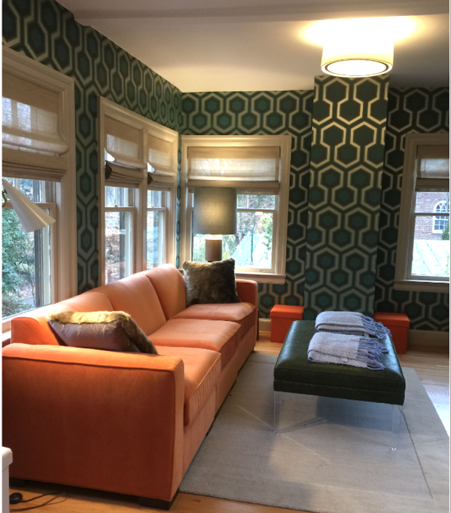 Room with green and blue hexagonal wallpaper
