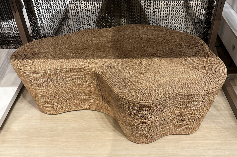 Curvy woven materials ottoman table for family room