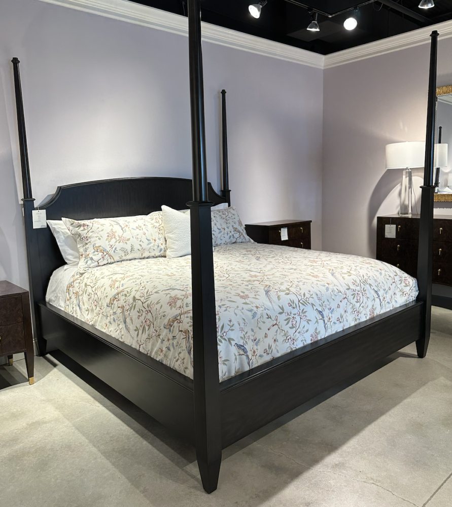 Elegant black four-poster bed