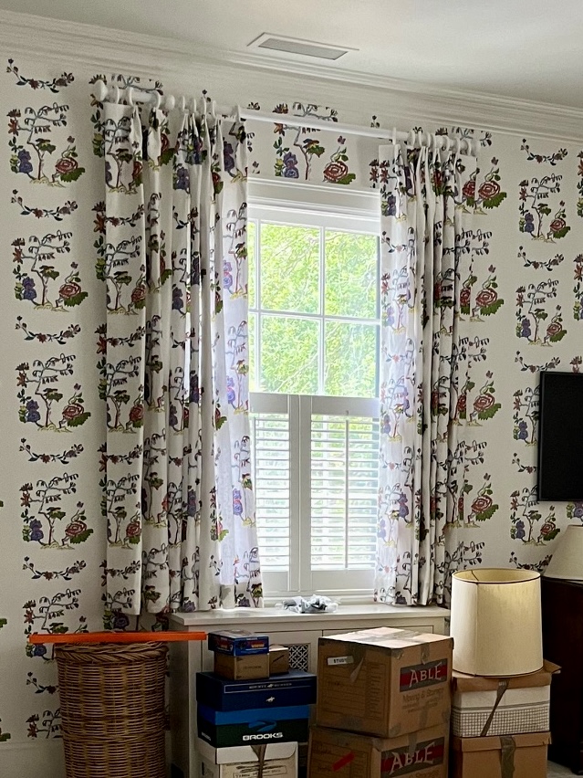 Floral curtains matching the wallpaper - same pattern on both