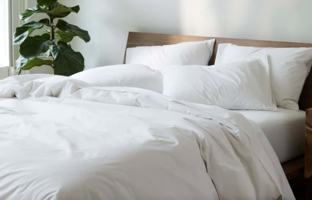 White sheets on a bed