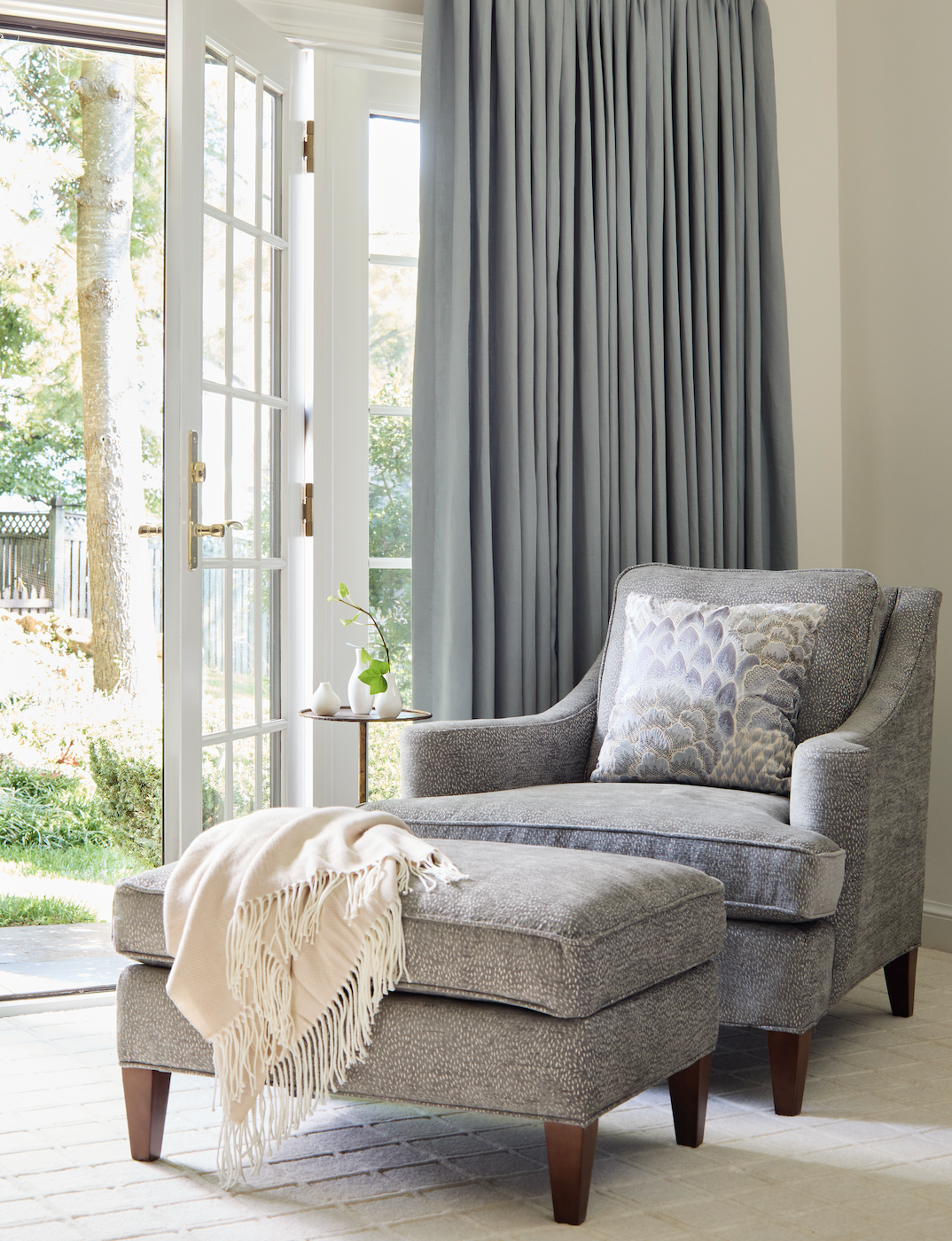 Light blue chair against white walls