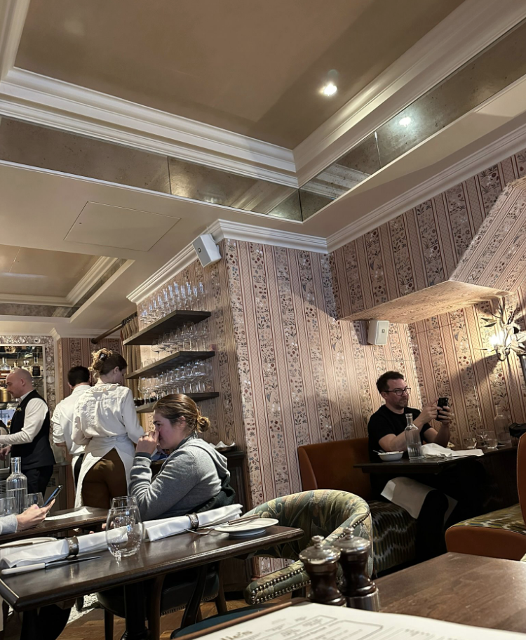 Restaurant with mirrors on fronts of soffits