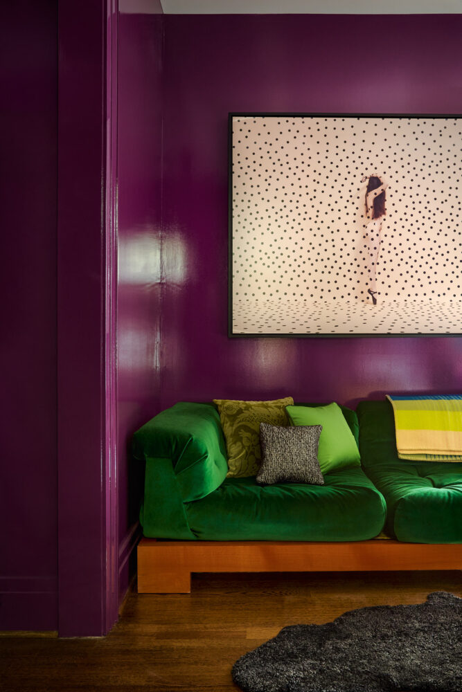 Room with glossy shiny purple walls