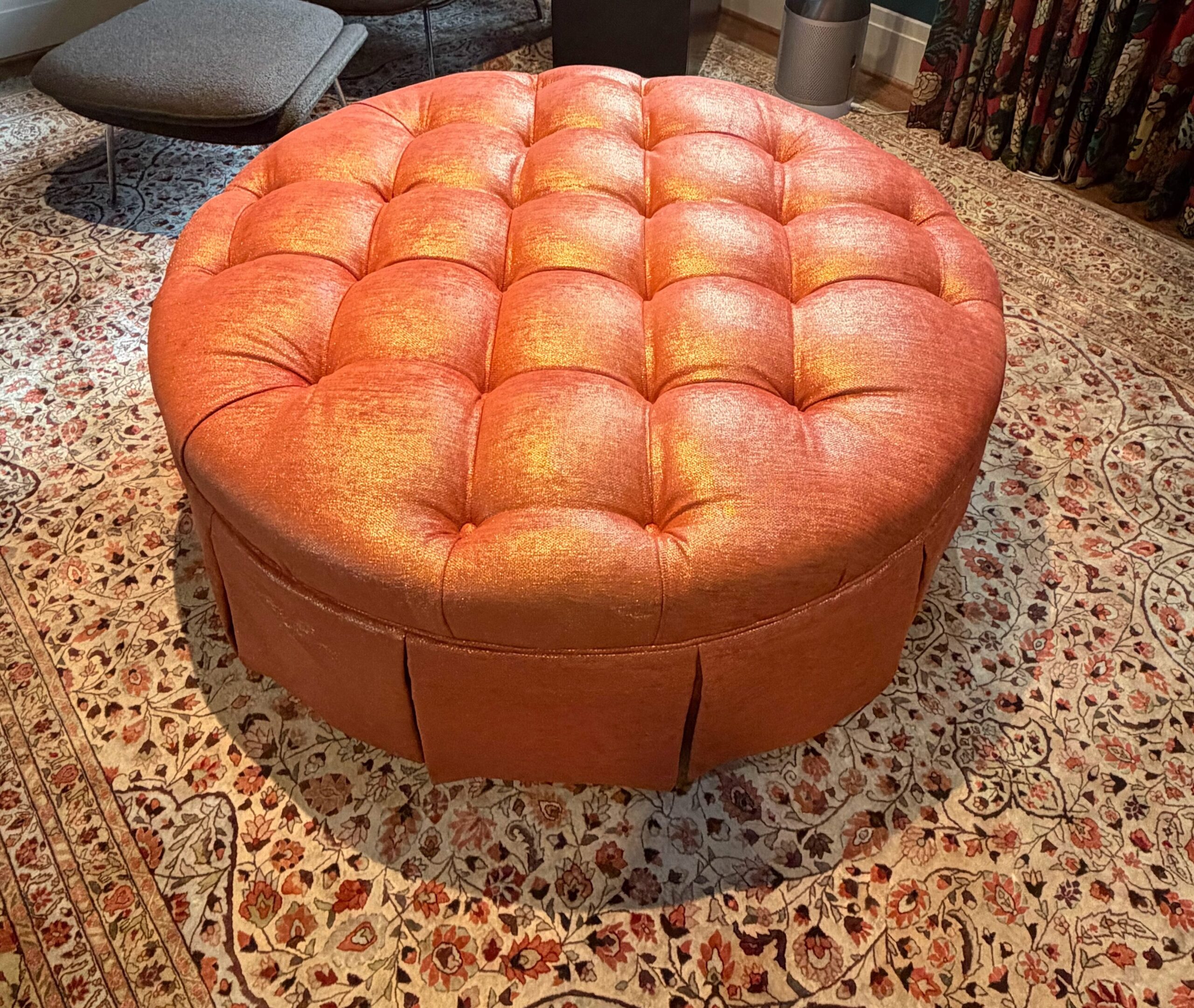 Skirted ottoman in orange sparkly fabric