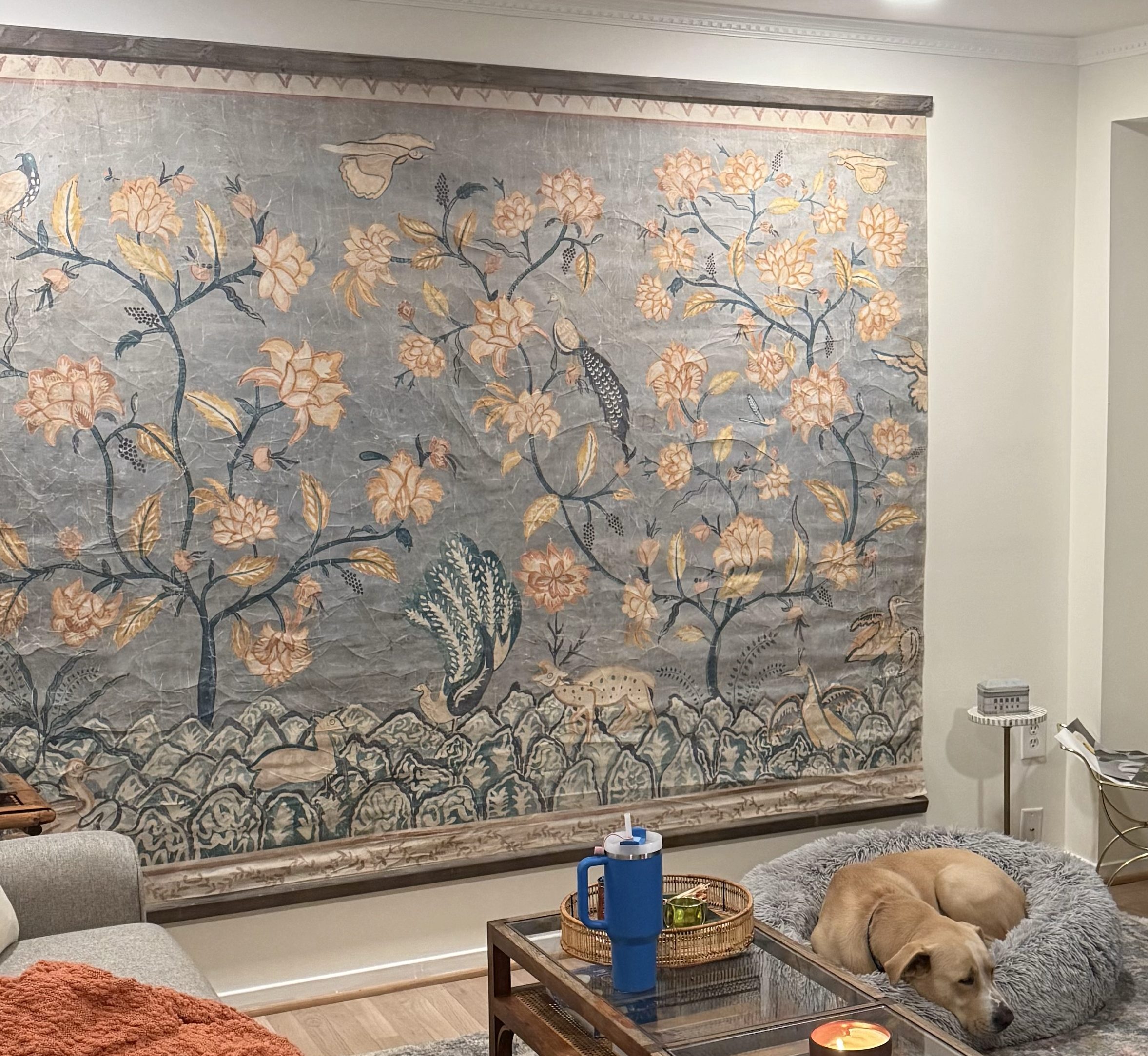 Tapestry hanging on wall in living room