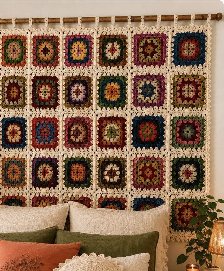 Granny square wall art above bed