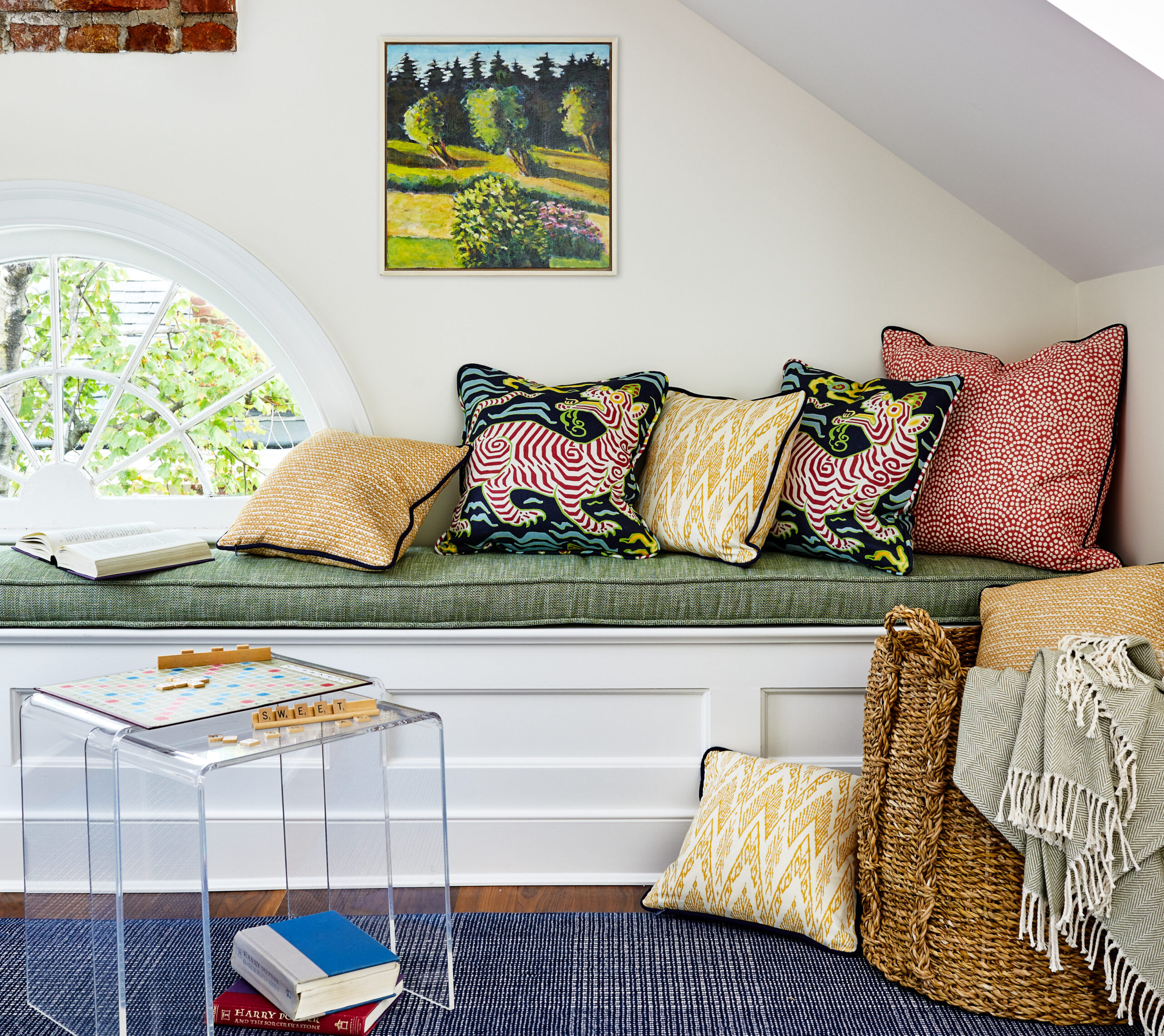 Bench with various patterned pillows