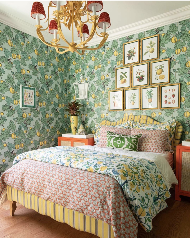 Wallpapered room with lots of patterns