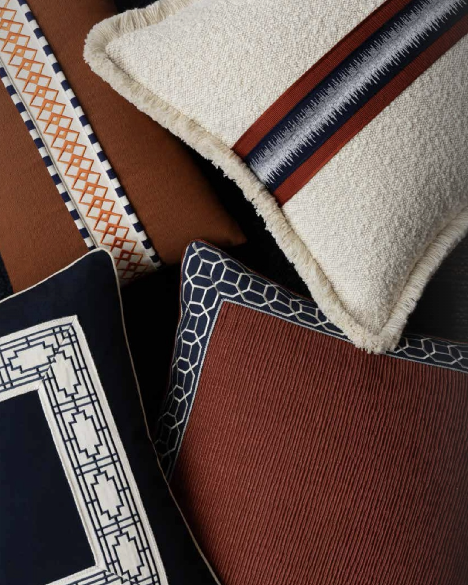Pillows with inset trim in a variety of placements.