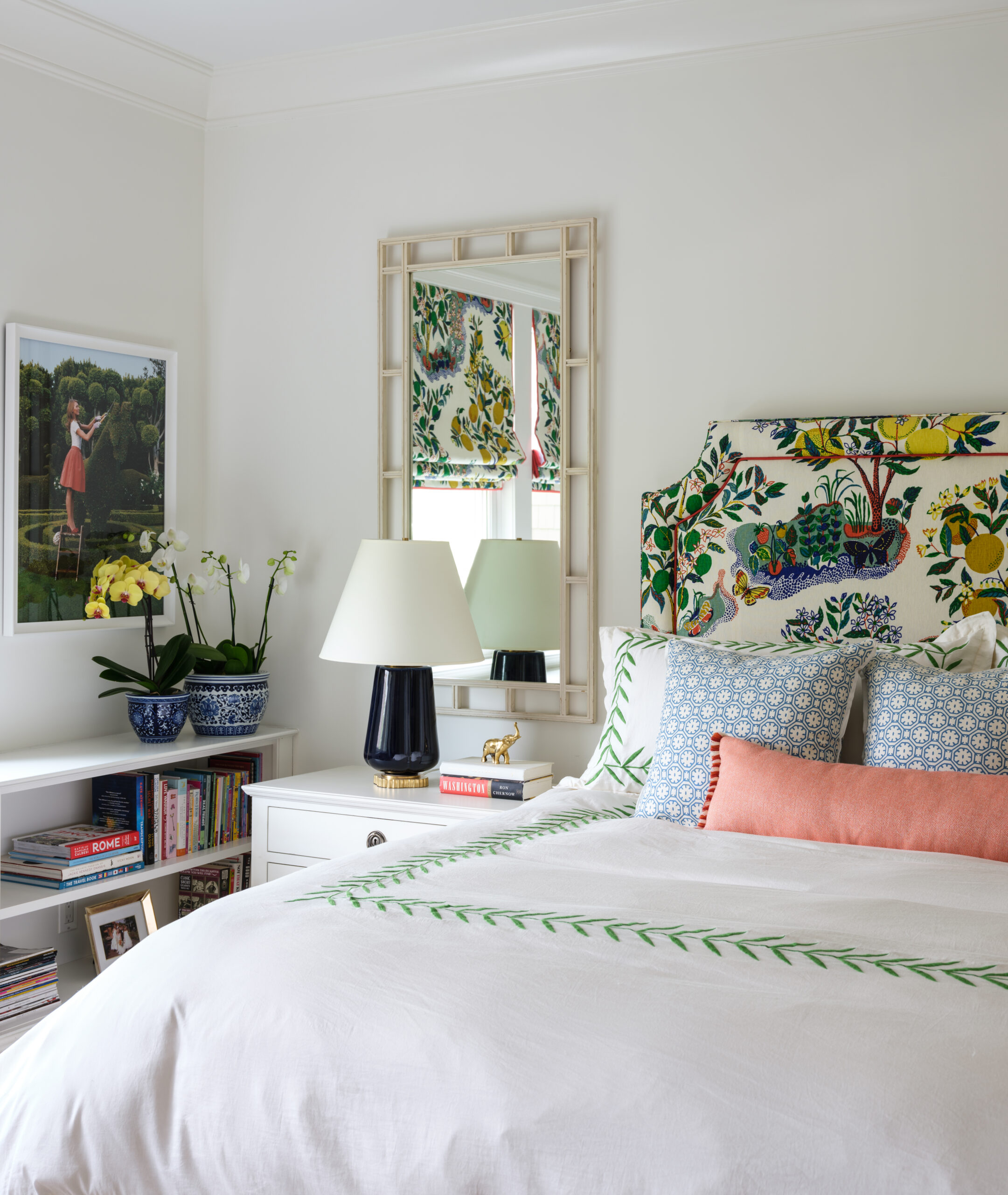 Bedroom with pillow shams and decorative patterned pillows